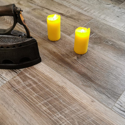 Каменный SPC ламинат Stone Floor Дуб Лофт Коричневыи?